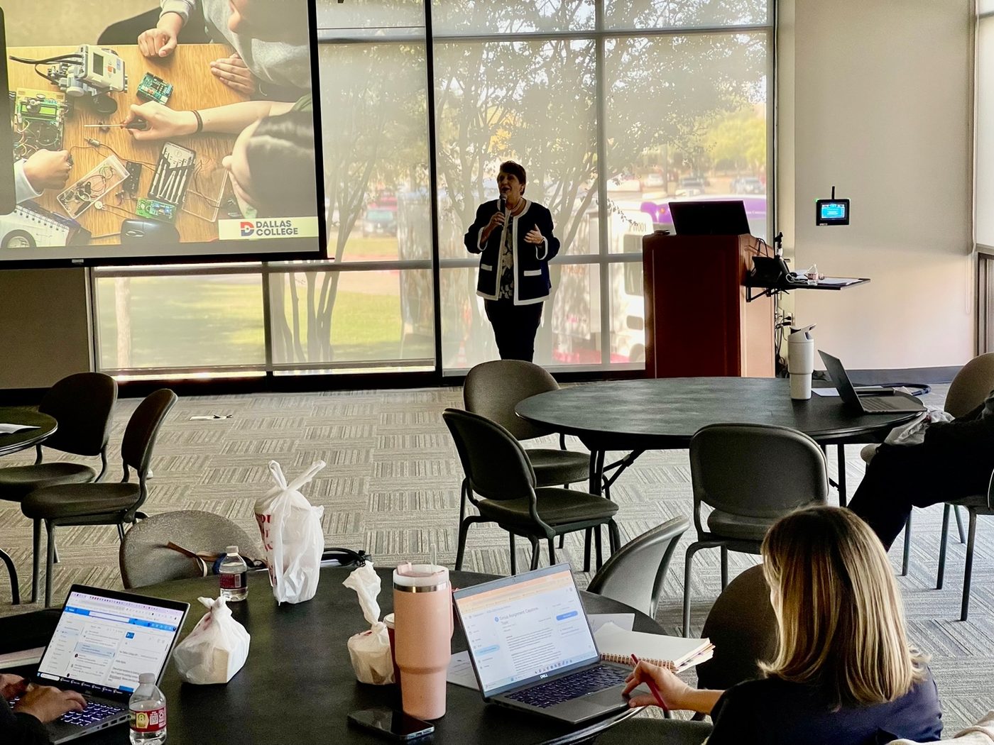 Dr. Burillo-Hopkins — Addressing delegates on the role of community colleges in the AI era.